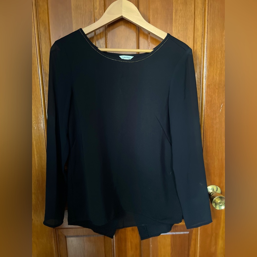 Calvin Klein women’s black top in XSmall. Sheer sleeves